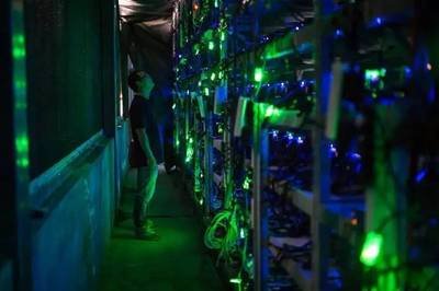 A mining farm powered by solar panels, illustrating the industry's shift towards renewable energy.
