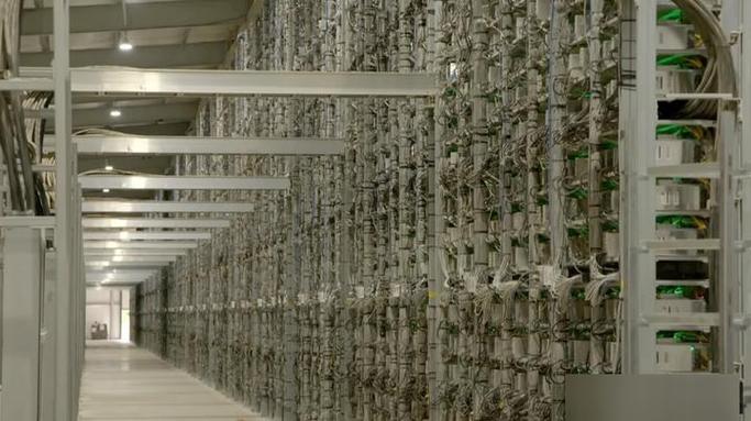 An overview of a sophisticated mining rig setup, highlighting components used in BTC and ETH mining